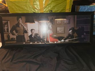 Chris Consani’s classic "Legal Action" artwork depicting Hollywood legends like Marilyn Monroe and Elvis Presley gathered around a pool table