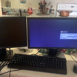 Dell monitors, keyboard and mouse.