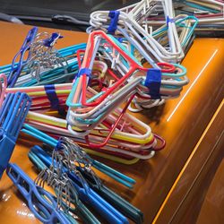 Over 60 plastic hangers $7.00
