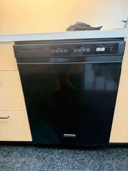 Black KitchenAid dishwasher Model No. KUDK03ITBL0