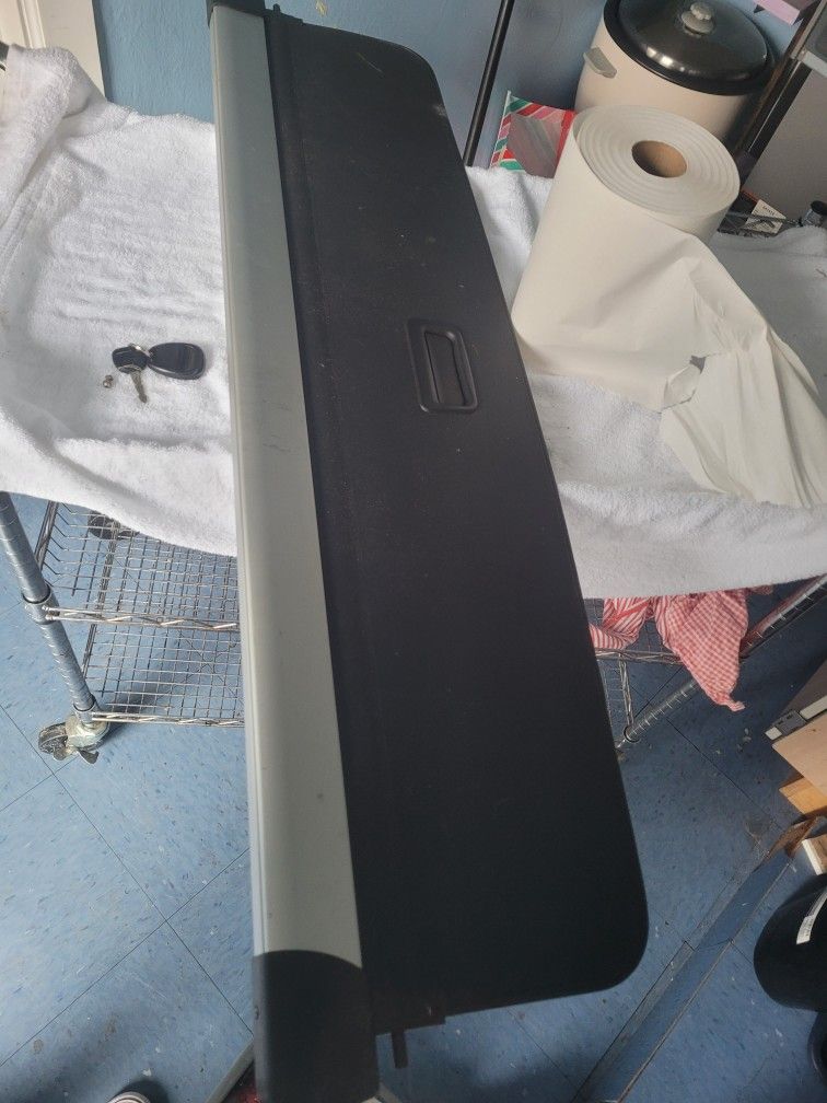 retractable cargo cover for a Land Rover Range Rover Sport.