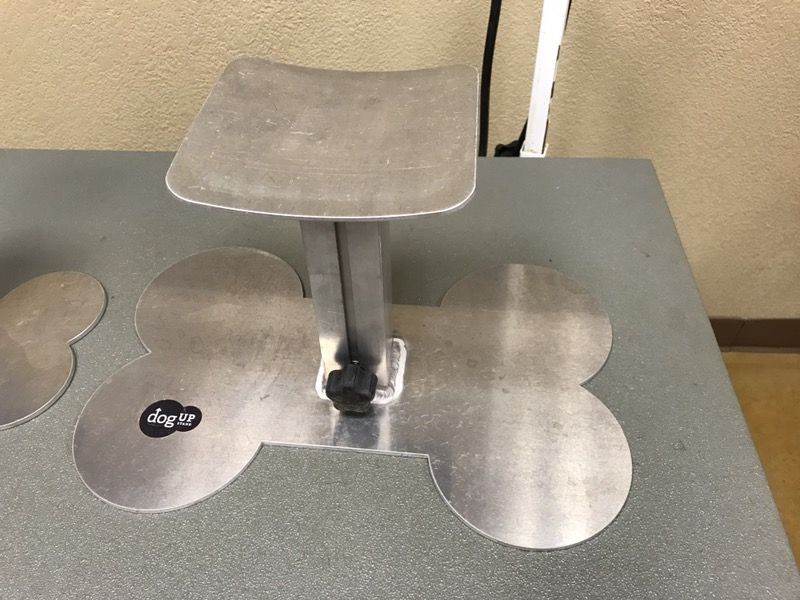 Dog up stand - helps hold dogs up for grooming $150