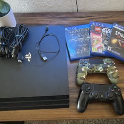 PlayStation 4 Pro + 2 Controllers And 3 Games - Like New!
