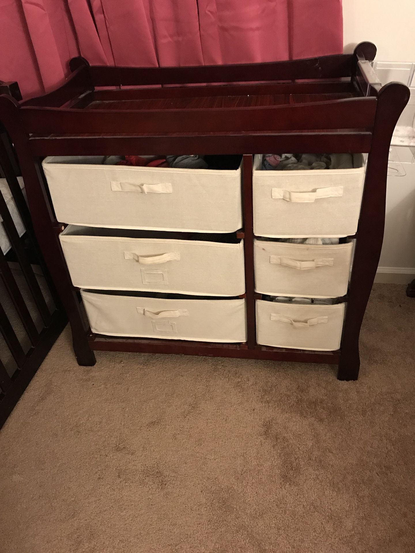 Changing table / dresser with diapers dispenser