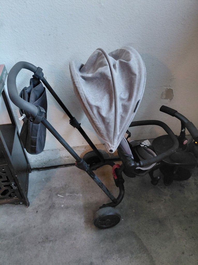 Pushing Smartrike Stroller/ Trycicle 