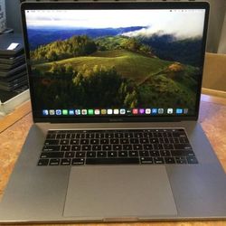 Apple MacBook Pro 15" Mid 2018 Touchbar 6 Core i9 32gb 1TB SSD


