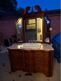 Unique bathroom vanity with sink and mirror