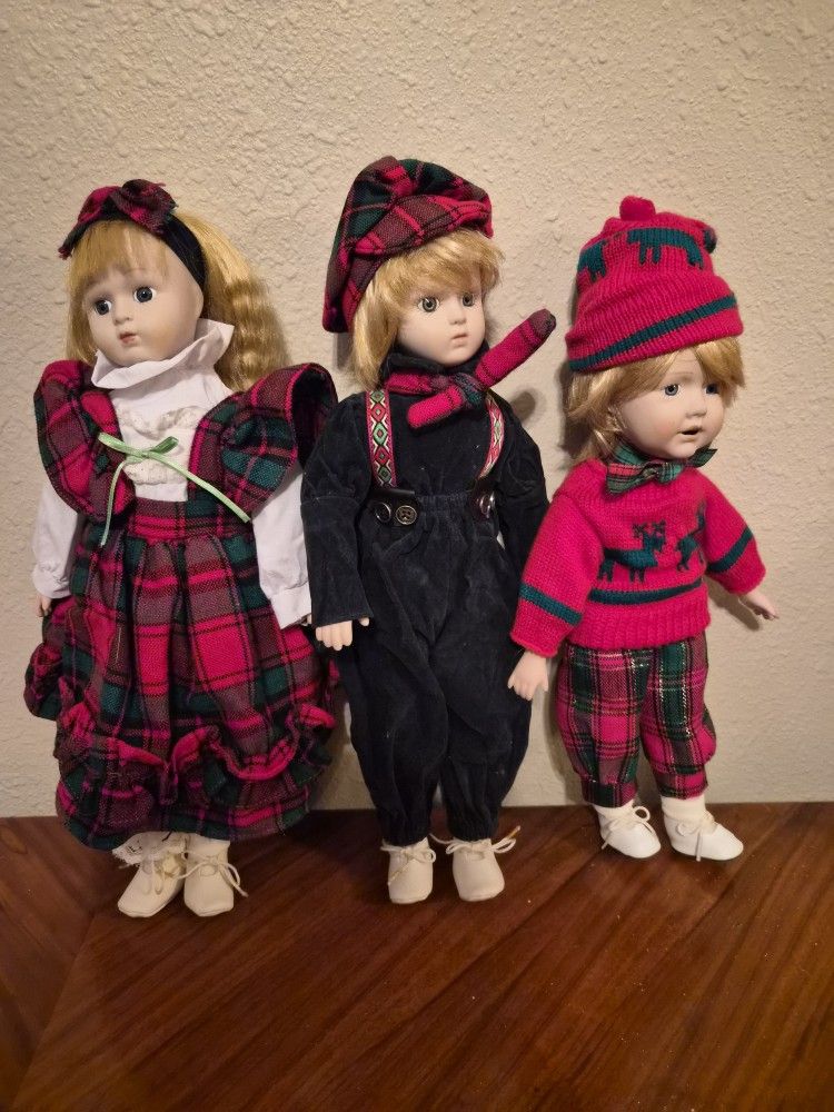 Three (3) Vintage Porcelain Holiday Dolls