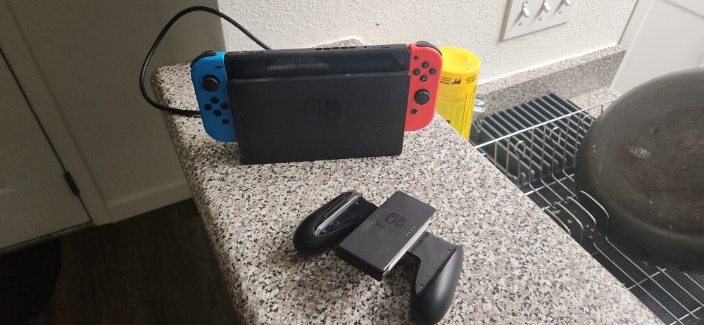 Nintendo Switch Console With Controller Handle