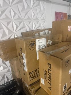 Lots of sealed new gaming cases and psu and motherboards