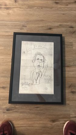This image features a 2016 caricature of former presidential candidate Bernie Sanders depicted in black ink on paper, displayed in a black frame.