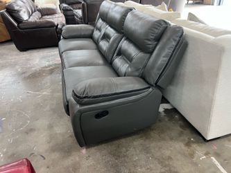 Leather reclining sofa