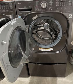 LG Front-Load Washer + Gas Dryer Set with Storage Pedestals