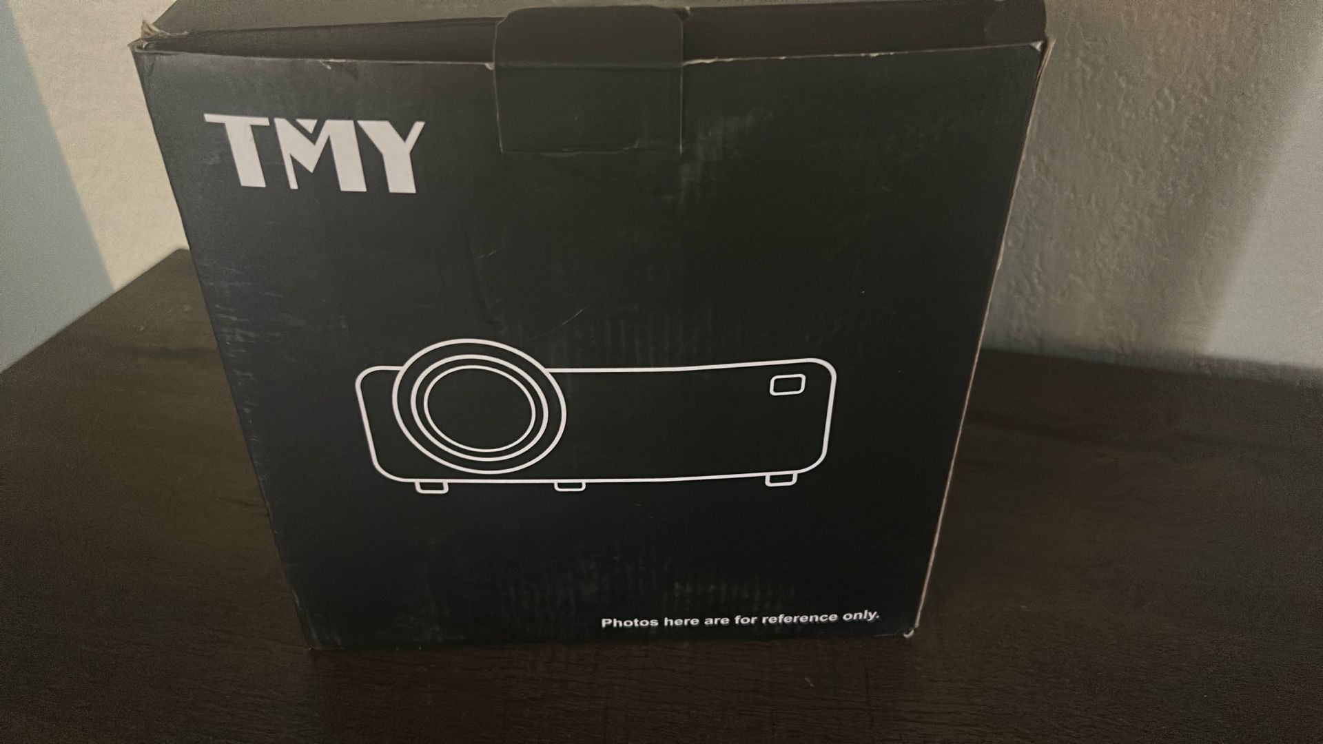 Mini projector box open but never used