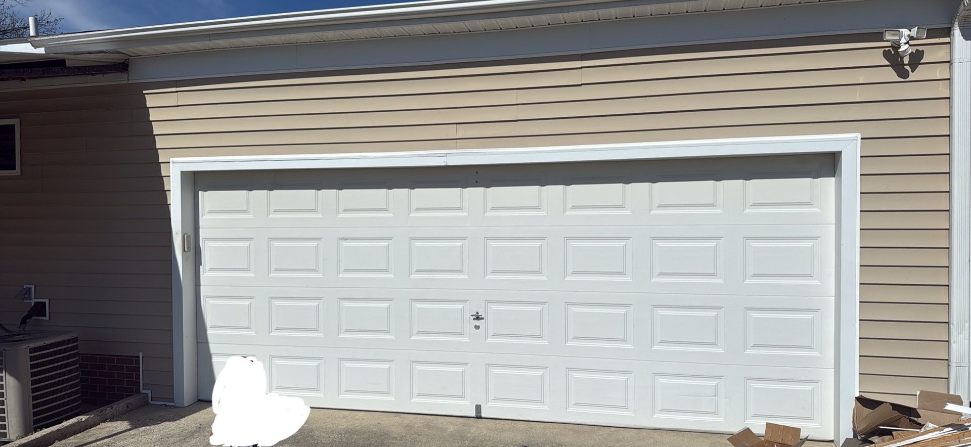 18’ x 7” Garage Door W/ Recently Installed Operator.