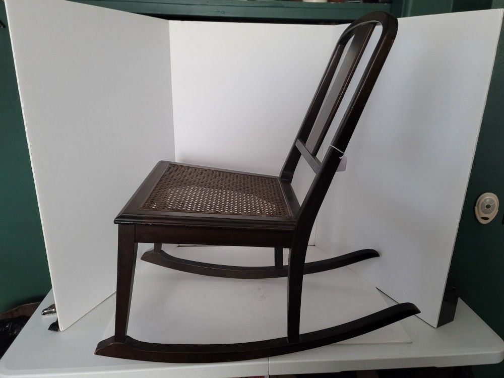 Antique Berkey & Gay Petite rocking chair with cane seat