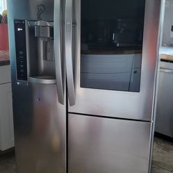 LG stainless steel side-by-side InstaView refrigerator