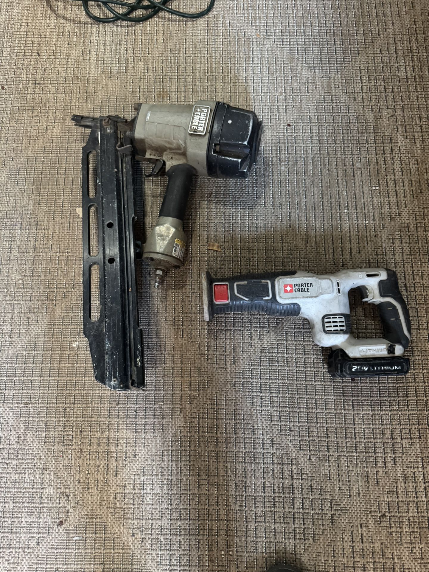 Porter-Cable pneumatic nail gun and a 20V MAX cordless reciprocating saw.