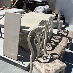 Table and four chairs used one free to pick up