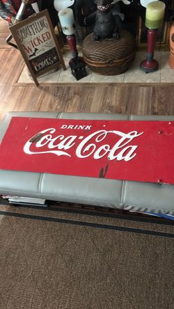 Vintage -metal Coca-Cola sign.