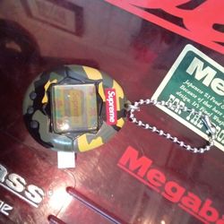 Supreme Tamogatchi $20