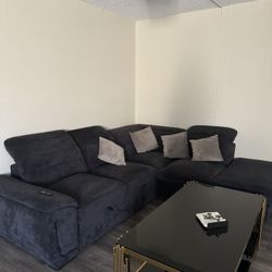 Large dark blue sofa, folding, with a storage box