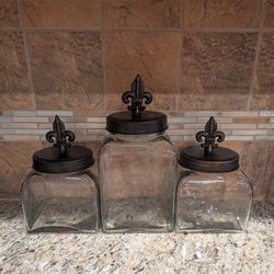 3 Piece Brown Metal Fleur De Lis Sealed  Lidded Square Thick Clear Glass Kitchen Canister Set
