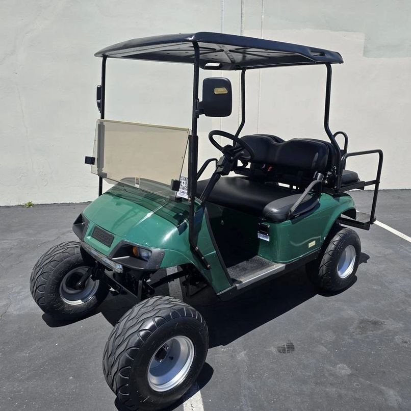 2006 E-Z-GO TXT PDS 4-Passenger Lifted 36-Volt Street Legal Golf Cart