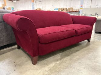 ROWE Vintage Red Velvet Sofa Featuring a Curved Silouette and Rolled Arms