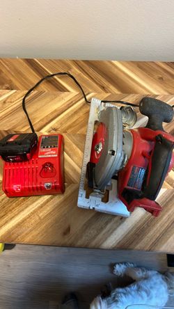 Milwaukee, Skil saw with charger and battery