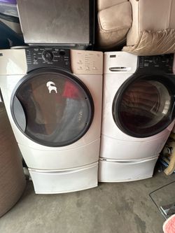 Kenmore elite washer and dryer set with storage drawers