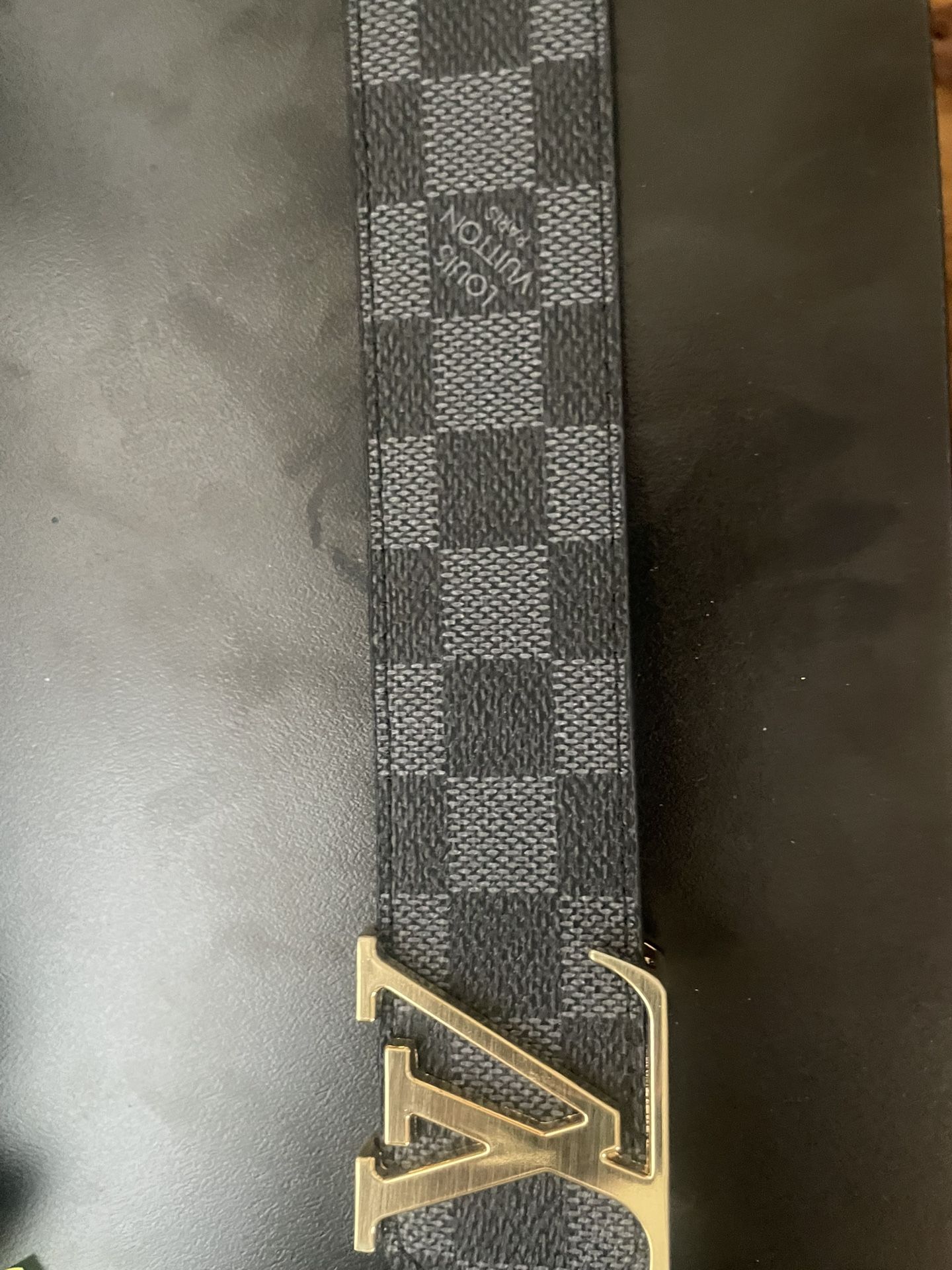 LV Initiales 40mm Reversible Belt in Damier Graphite canvas with a gold-tone LV buckle.