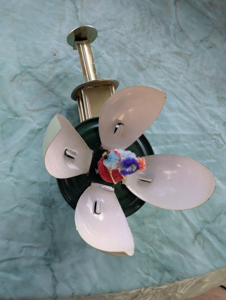 Easter Egg Tin Litho Metal Push Spinning Toy Spins Open to Reveal Chick/Bird.