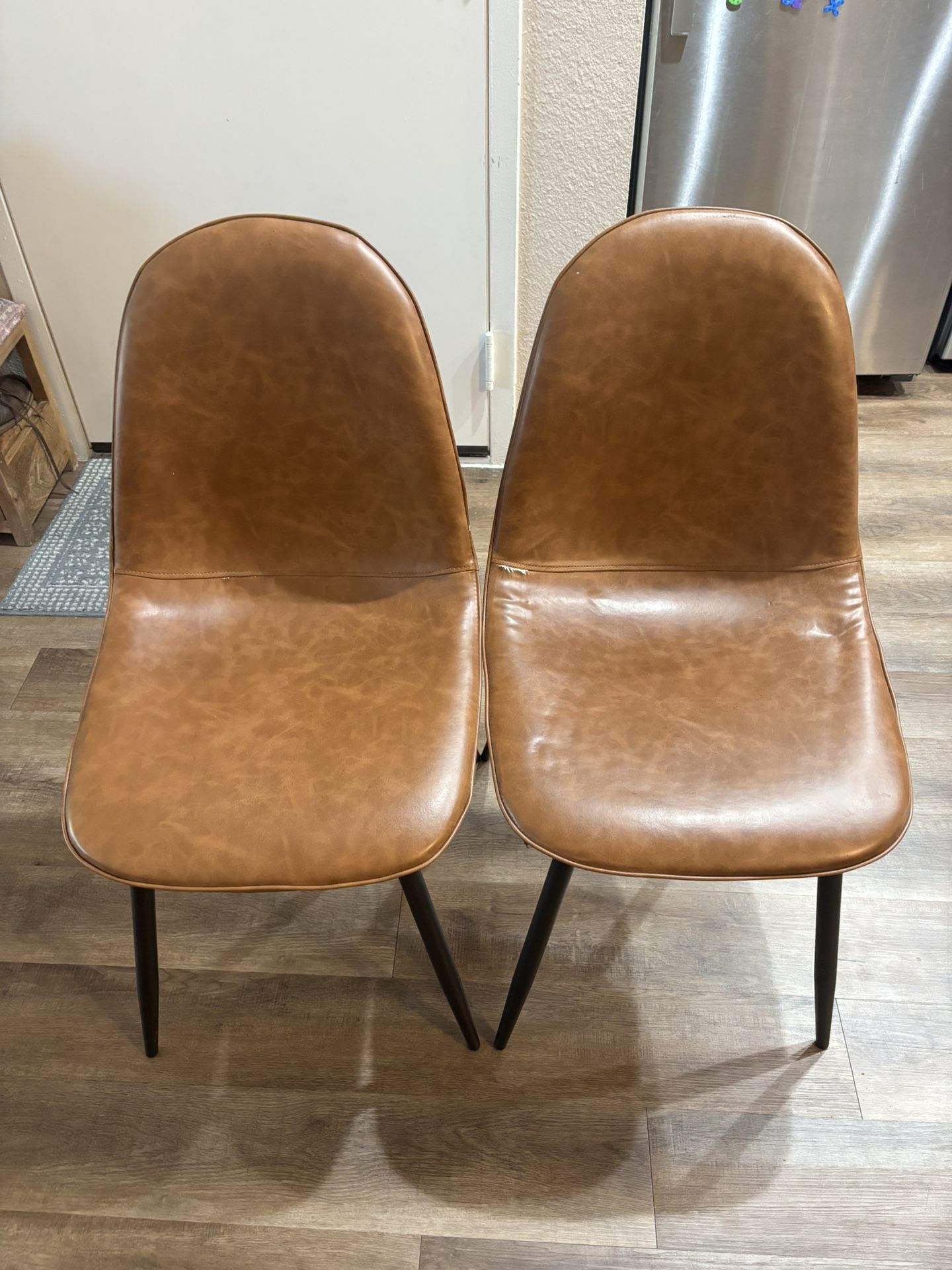 Faux Leather Chairs.