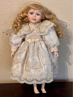 VINTAGE PORCELAIN GUARDIAN ANGEL DOLL