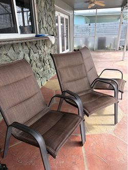 Outside chairs and tables and couch