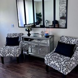 A pair of accent chairs