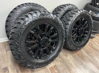-NEW 20 inch Gm style gloss black wheels wrapped in RBP 35x12.50R20LT tires. They are 8 lug 8x180 bolt pattern