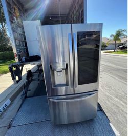 Fridge stainless steel LG with extra door deluxe everything works we deliver