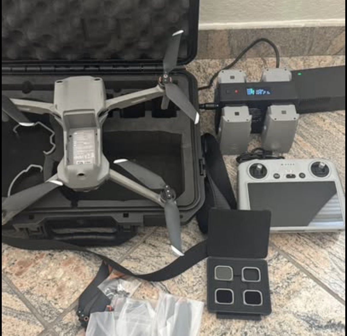 DJI Air 2S Fly More Combo with RMS330 remote and 4 batteries.
