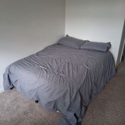 Full-size mattress  with metal bars frame