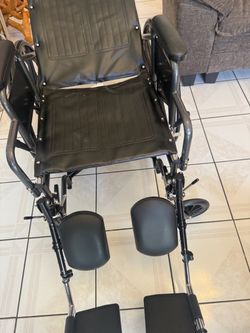 Black Wheelchair with Leg Rests