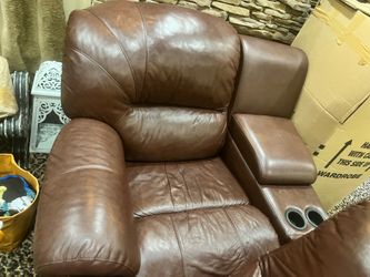 Brown leather like movie theater chairs