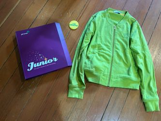 Girl Scouts Juniors handbook, jacket, and pin