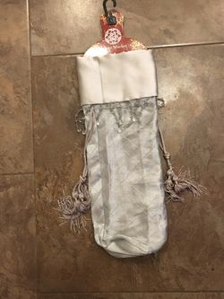 New silver colored wine bottle gift bag