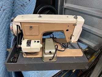 Sewing  Machine  $180