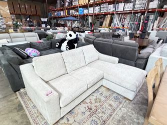 Beige sofa with reversible chaise from Costco