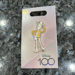 Disney 100 years Pin authentic 2023 Woody Toy Story.  Brand new on original card.  Smoke free home 