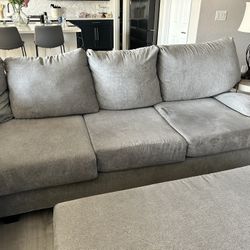 Gray Couch And Ottoman