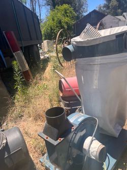 Wood chipper vacuum